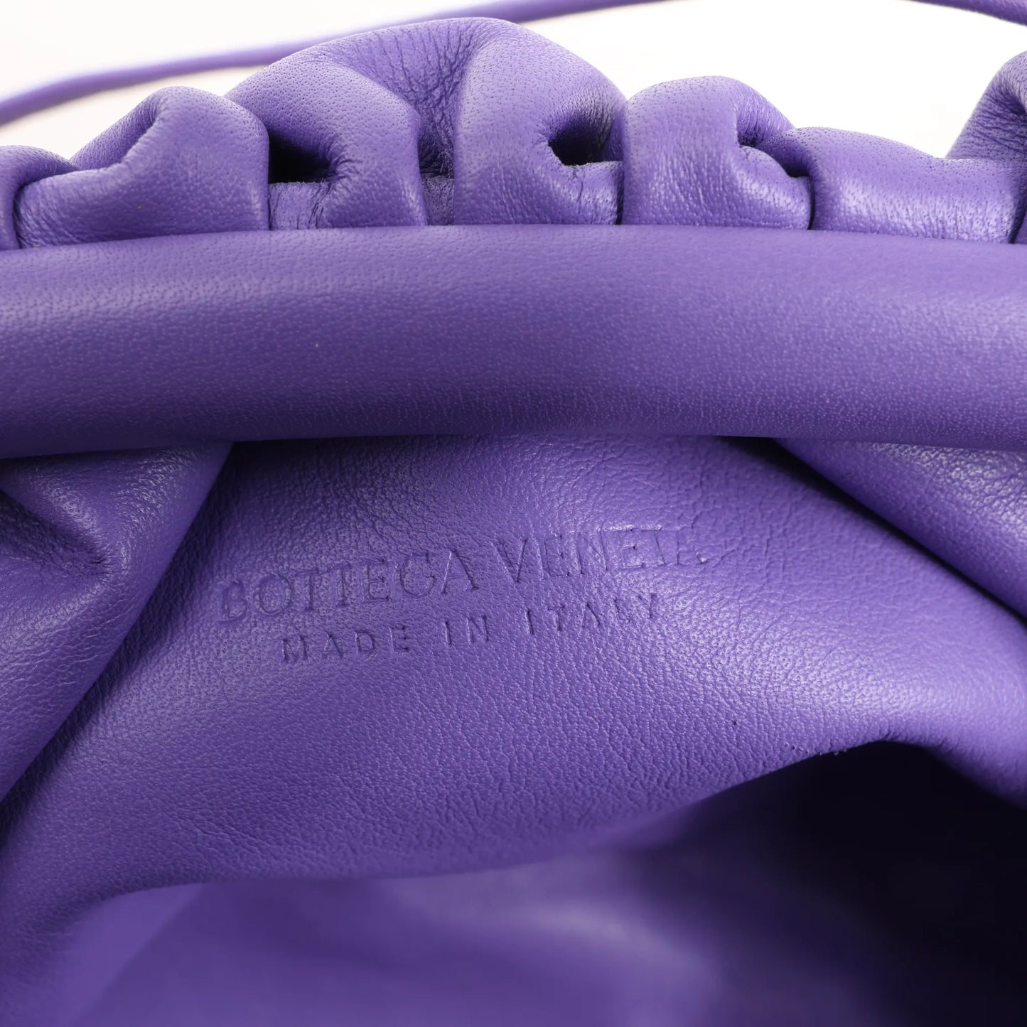 Bottega Veneta Mini The Pouch Leather Crossbody bag in Purple