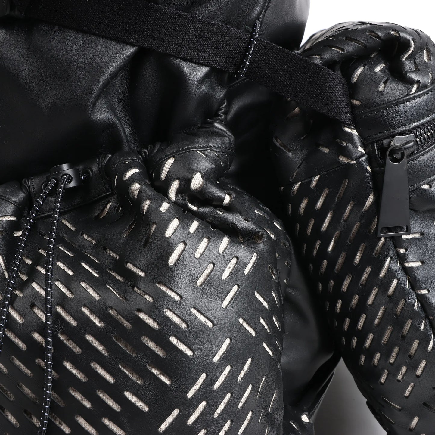 Bottega Veneta Perforated Leather Backpack in Black