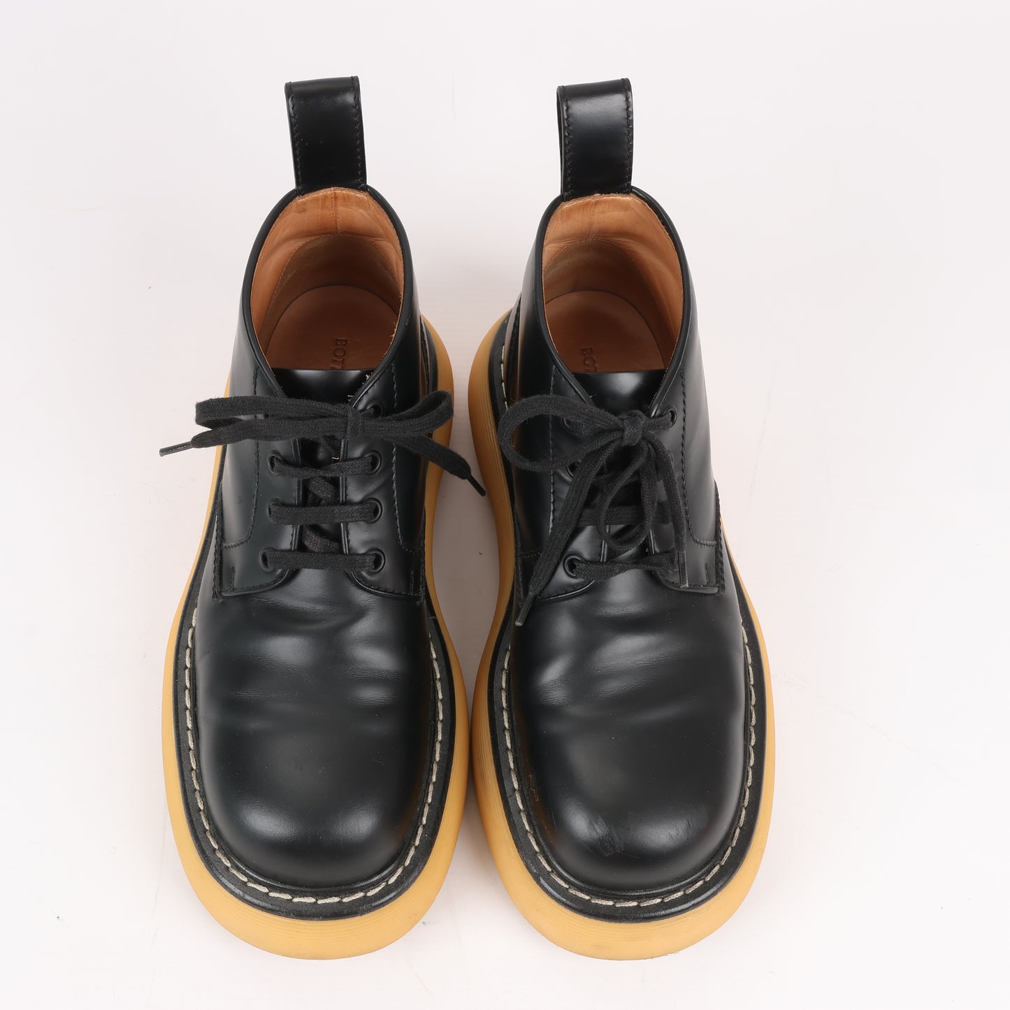 Bottega Veneta The Bounce - Bottines courtes en cuir noir et moutarde, pointure 39