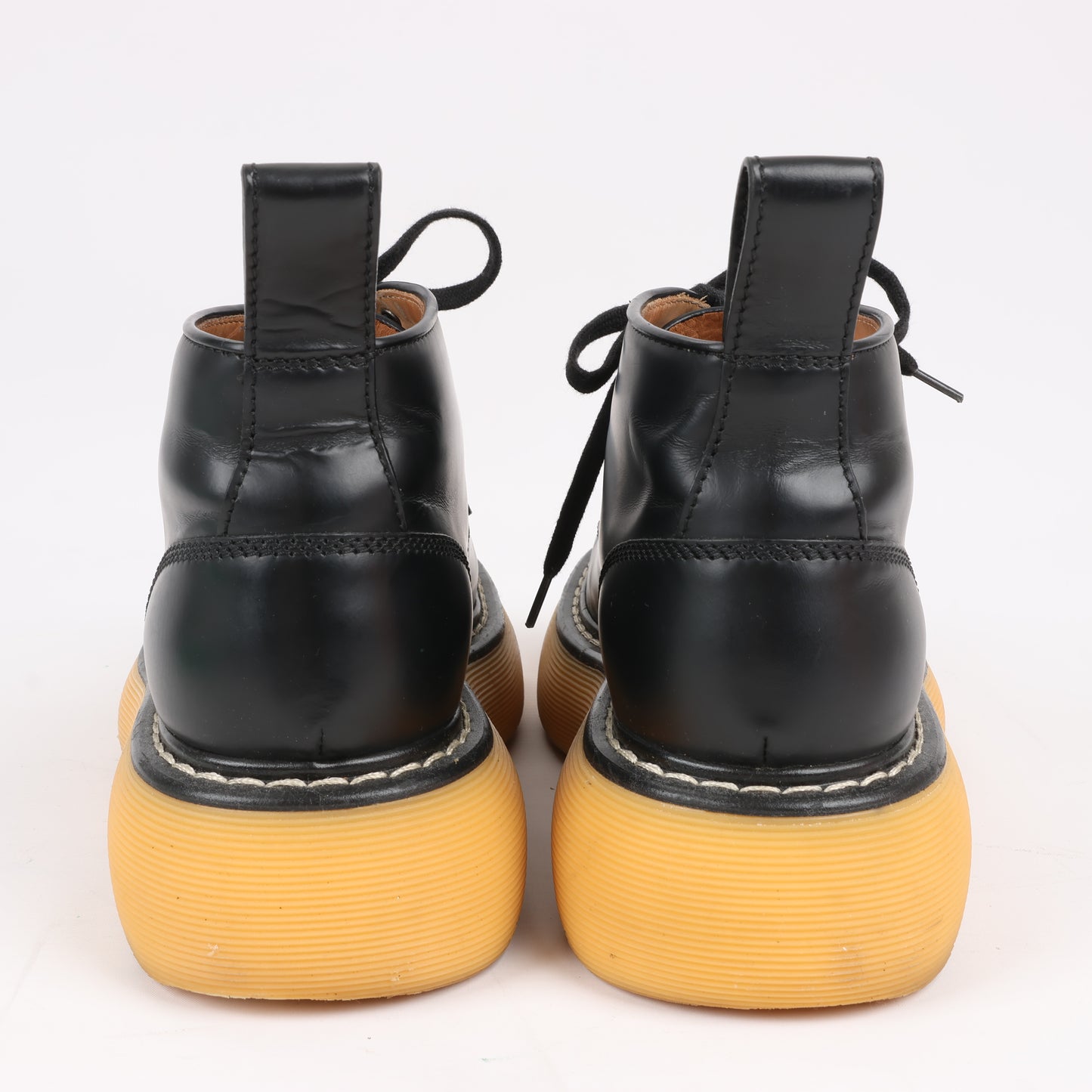 Bottega Veneta The Bounce - Bottines courtes en cuir noir et moutarde, pointure 39