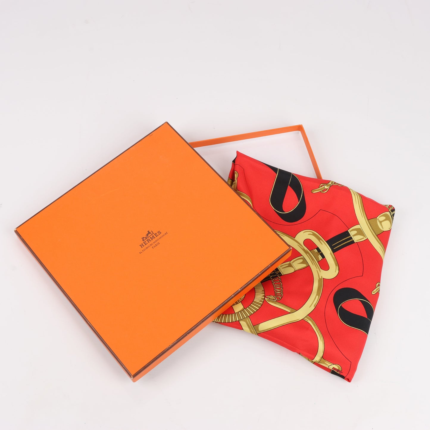 Hermès Carré 90 " Eperon d'or" Silk handkerchief in Red