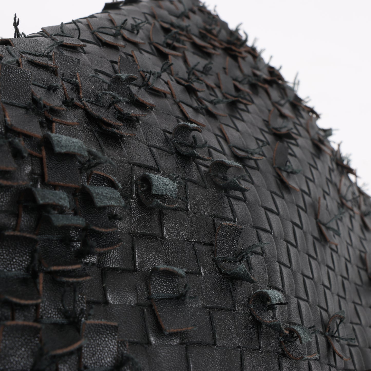 Bottega Veneta Sac à bandoulière en cuir Intrecciato en noir
