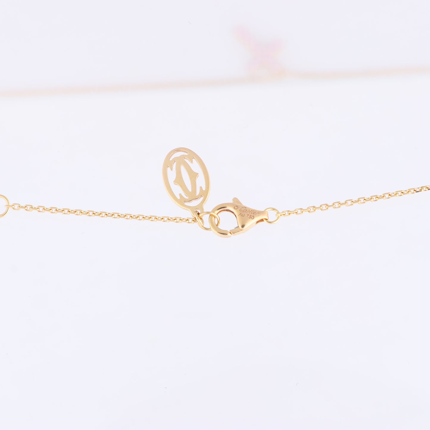 Collier Croix Cartier en saphir rose 750 (YG) 2,9 g
