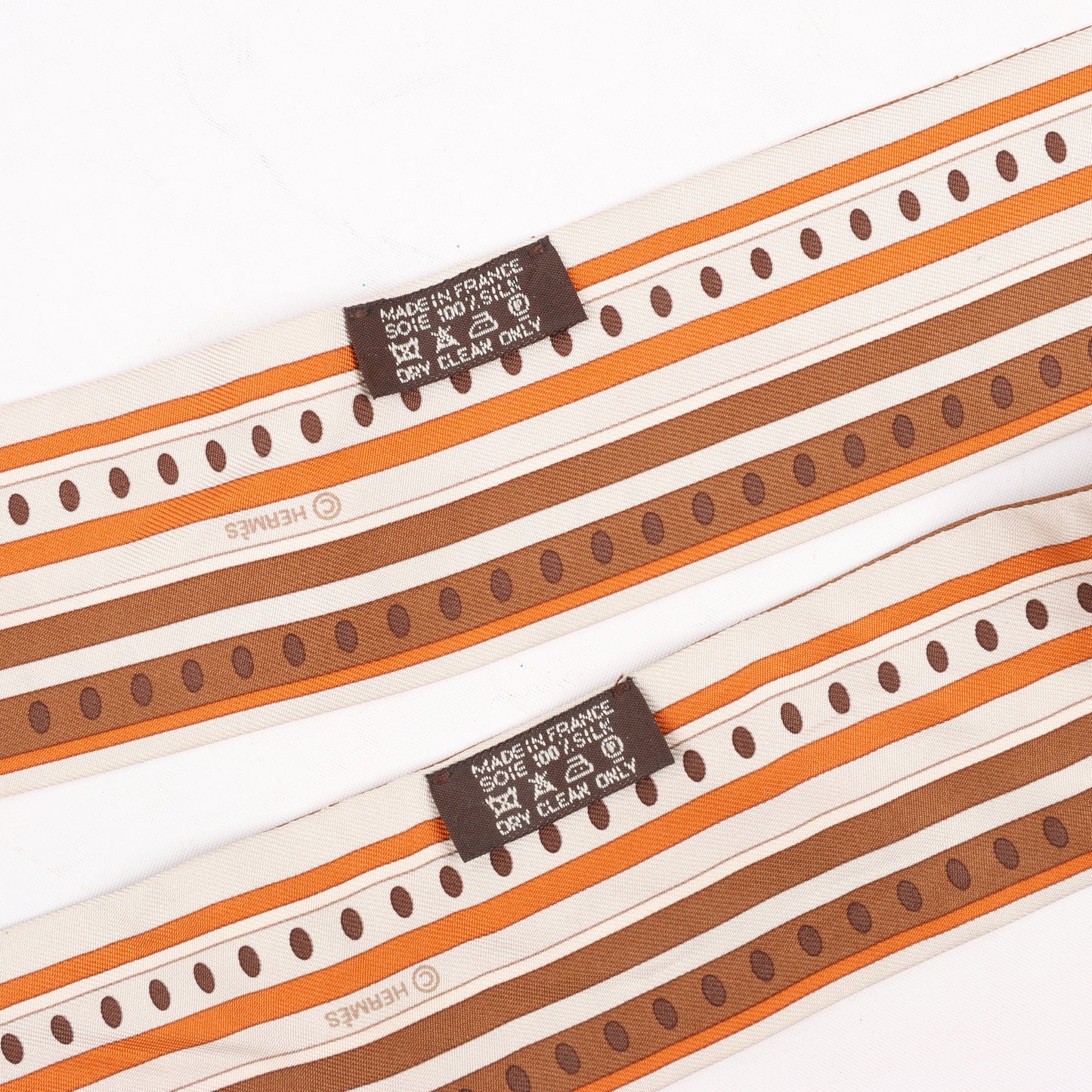 Hermès Sequences Horse Twilly Scarves in Orange