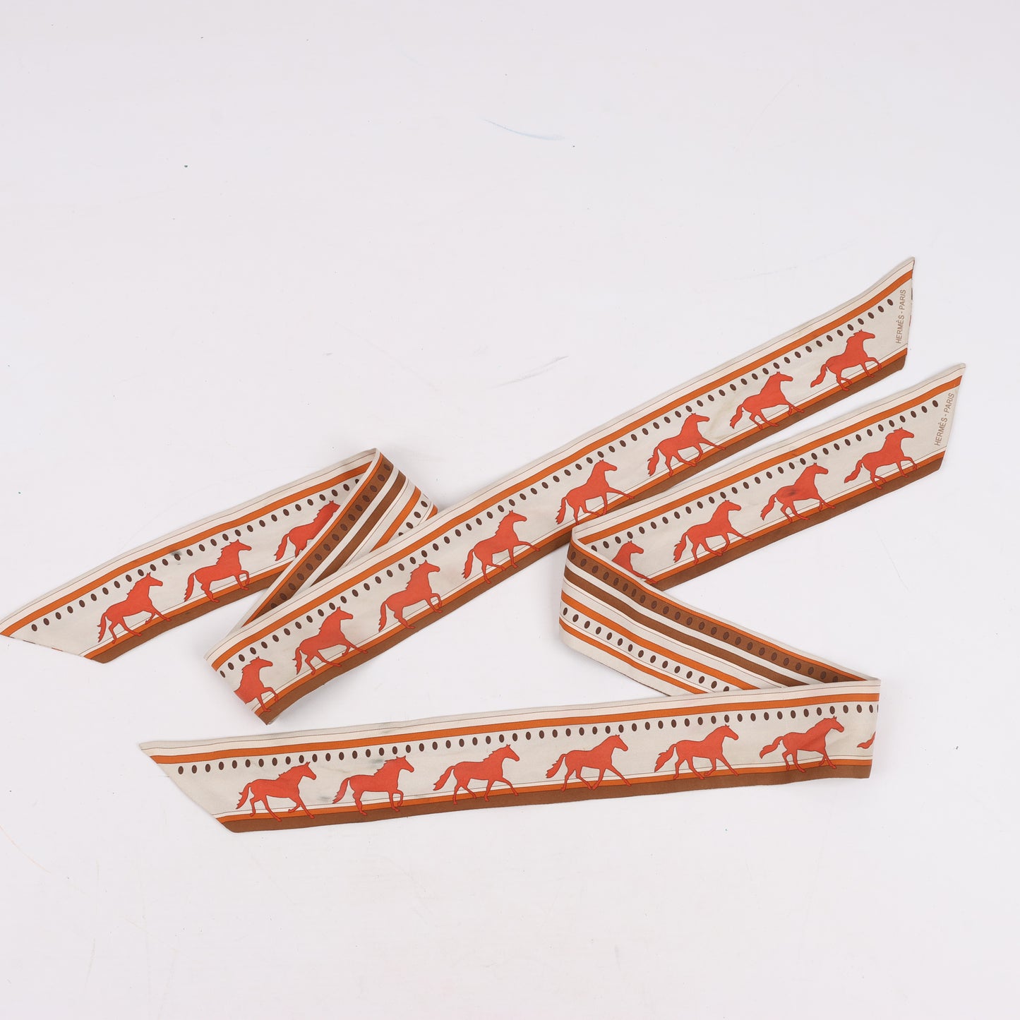 Hermès Sequences Horse Twilly Scarves in Orange