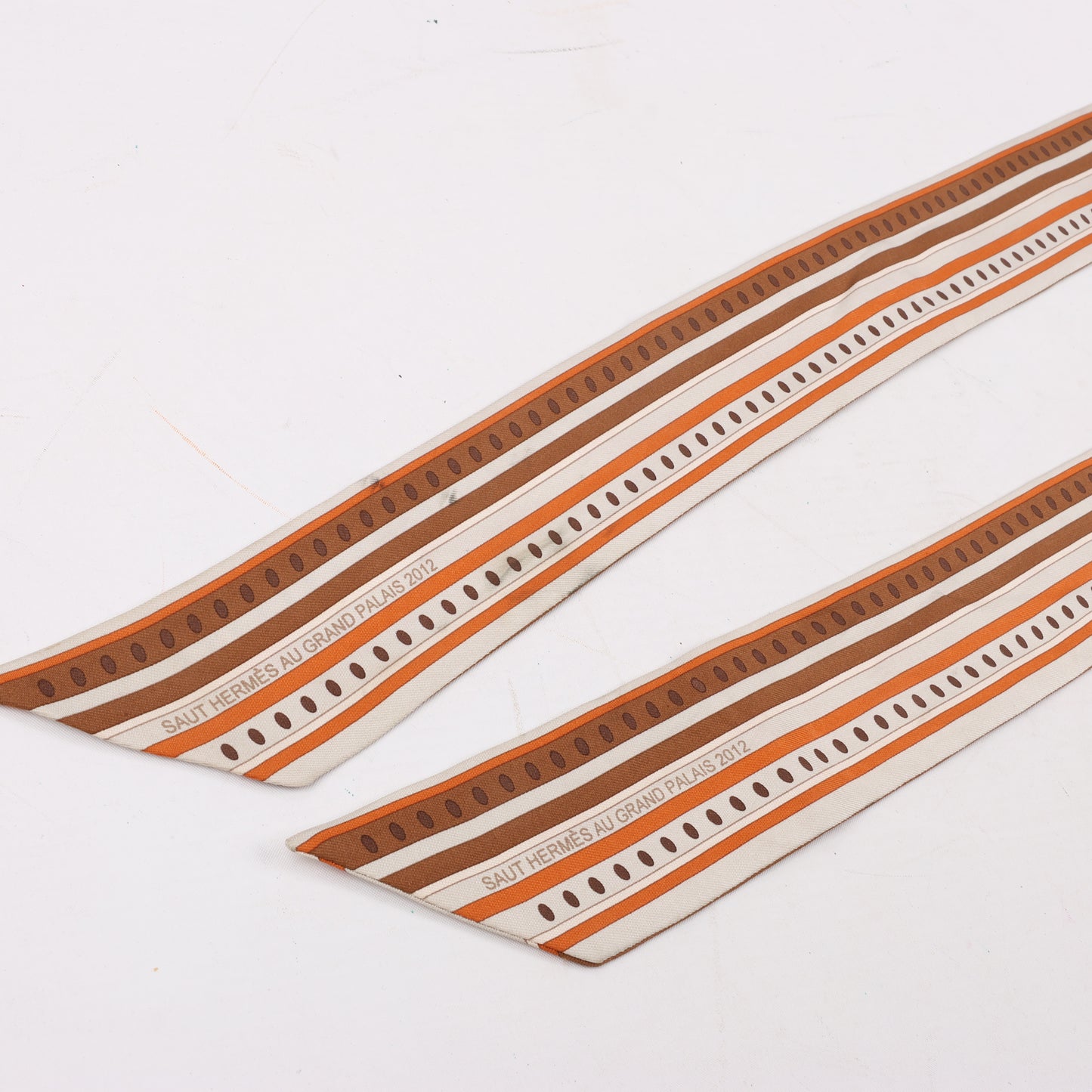 Hermès Sequences Horse Twilly Scarves in Orange