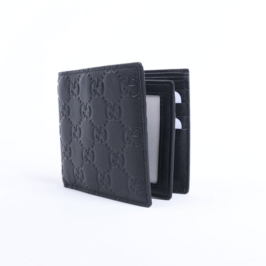 Portefeuille compact en cuir noir Gucci Guccissima 212185