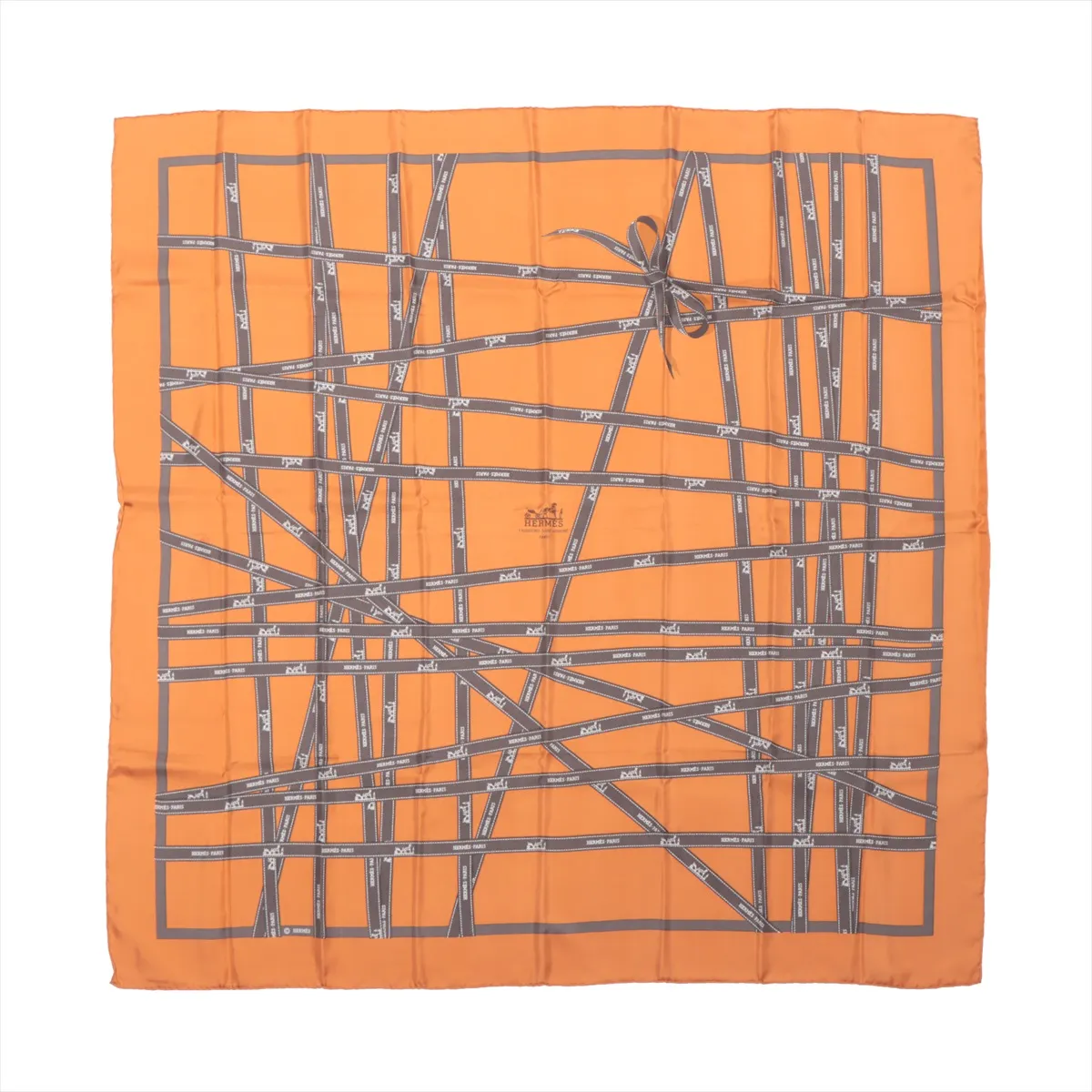 Hermès Carré 90 “Bolduc Ribbon” Silk Scarf in orange featuring gray ribbon pattern with Hermès Paris logos, square shape, and neatly bordered edges, displayed flat on a white background.