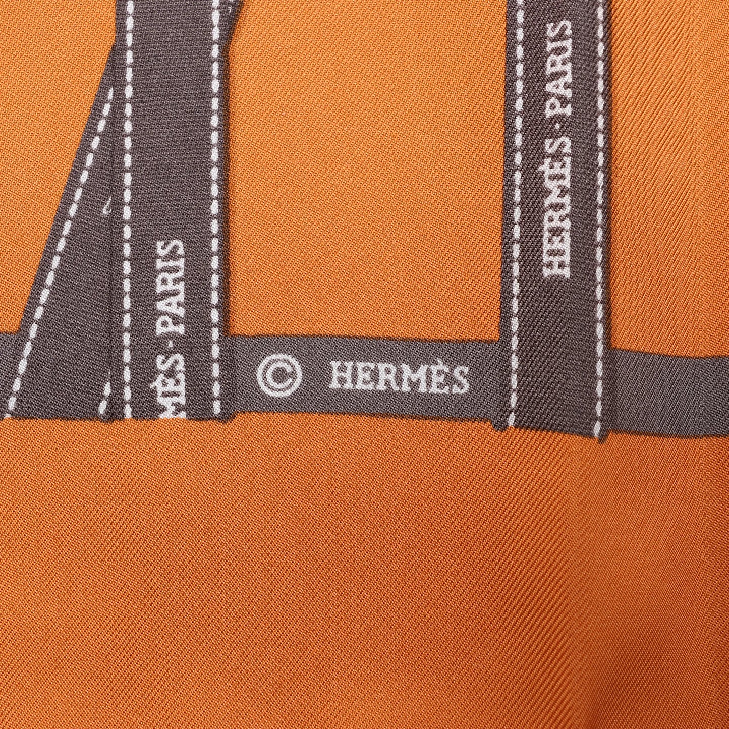 Hermès Carré 90 "Bolduc Ribbon" Silk handkerchief in Orange