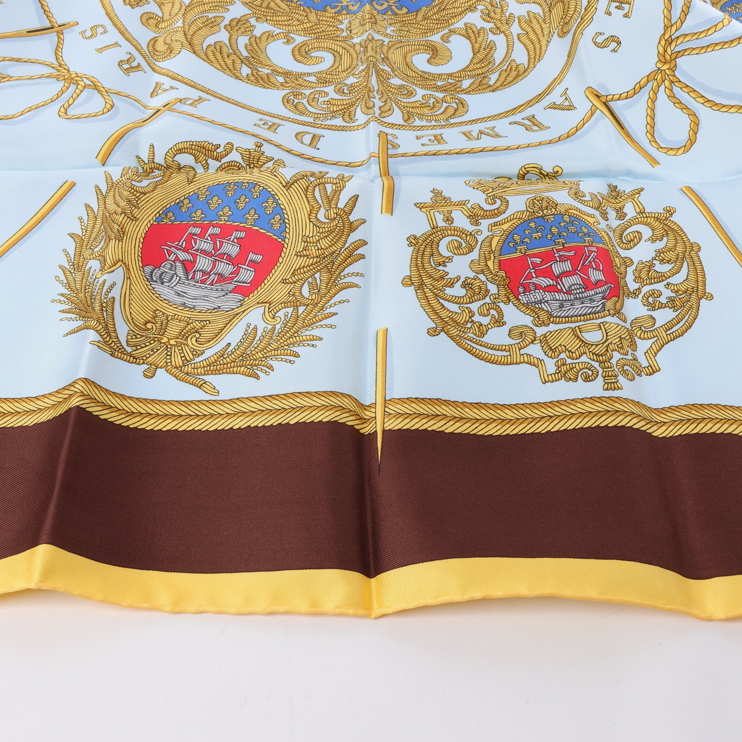 Hermès Carré 90 "Les Armes de Paris" 100% Silk Scarf in Brown and Blue