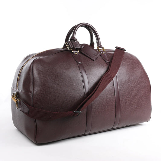 Sac de voyage Louis Vuitton Taiga GM Kendall en bordeaux