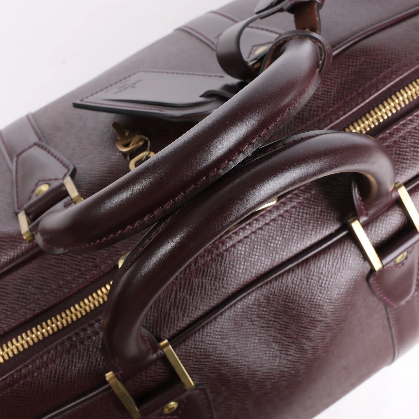 Louis Vuitton Taiga GM Kendall Travel bag in Burgundy