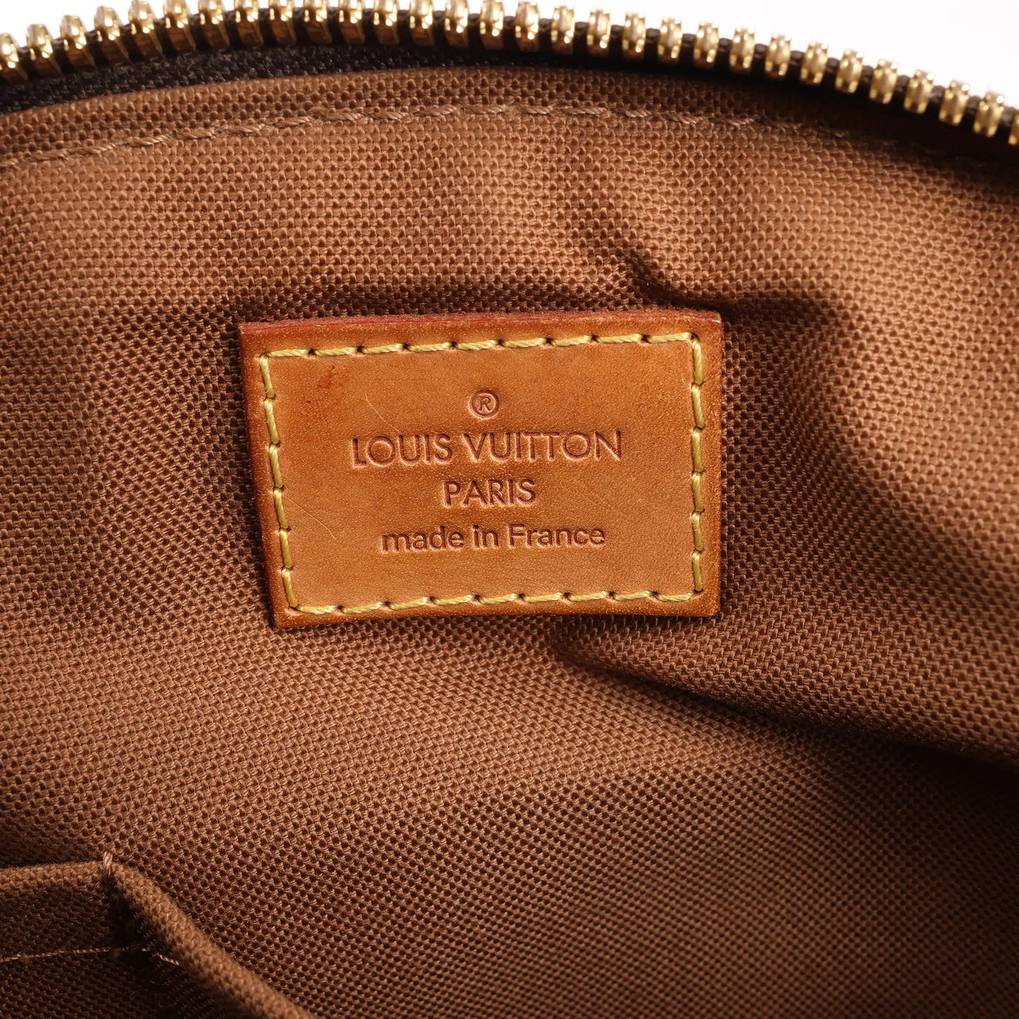 Louis Vuitton Monogram Canvas Tivoli PM Handbag in Brown M40143