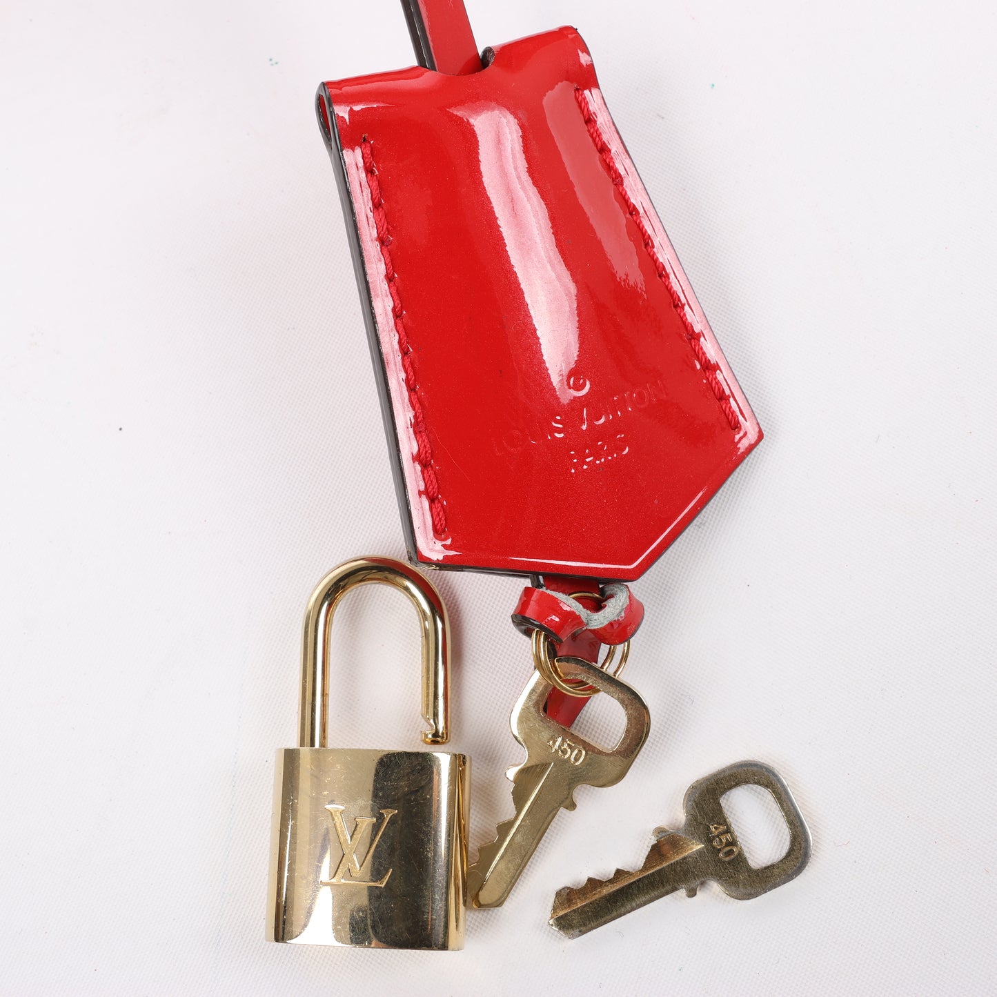 LOUIS VUITTON Vernis Alma PM Handbag in Red M90096