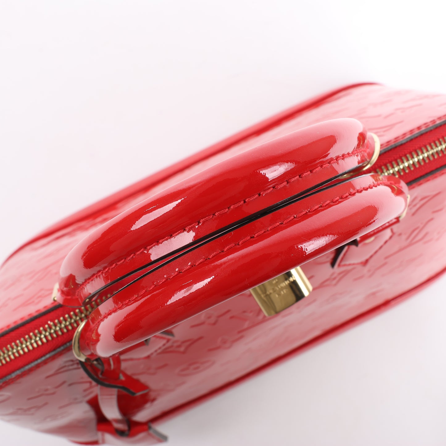 LOUIS VUITTON Vernis Alma PM Handbag in Red M90096