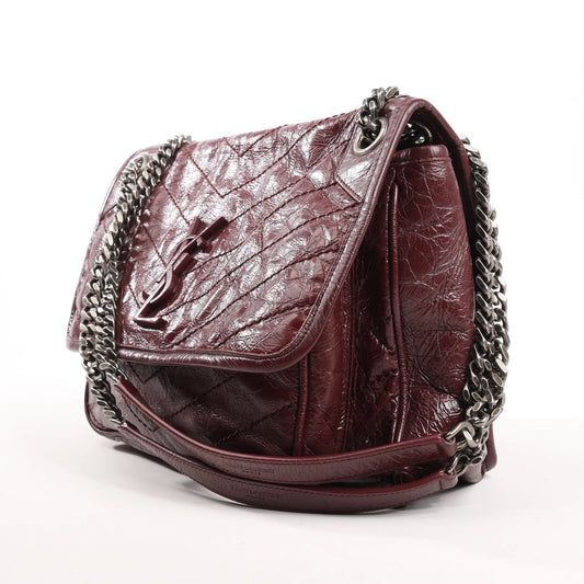 Sac à bandoulière Saint Laurent Paris Niki en cuir bordeaux avec chaîne 498894