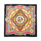 Black Hermès Carré 90 silk scarf laid flat with ornate red, gold, ivory and blue clock and timepiece motifs.