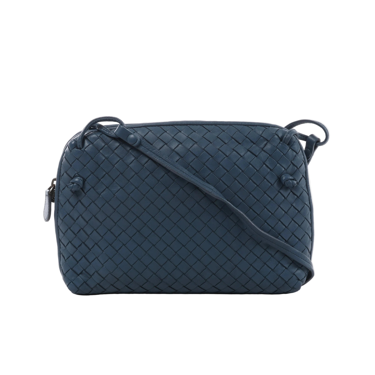 Blue Bottega Veneta Nodini crossbody bag with woven Intrecciato leather, slim shoulder strap, knotted details and zip closure.