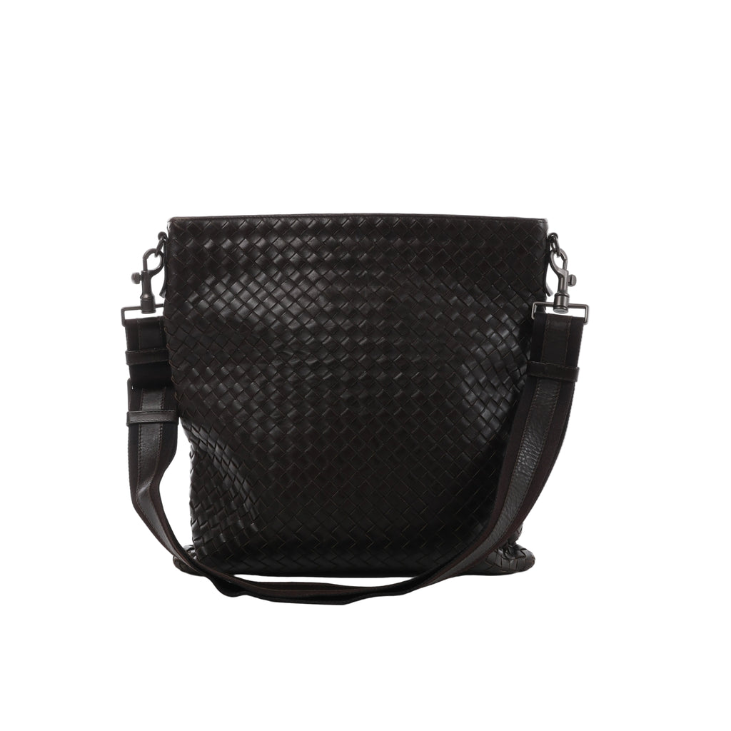 Brown Bottega Veneta Intrecciato woven leather messenger bag with a wide adjustable shoulder strap and dark metal hardware.