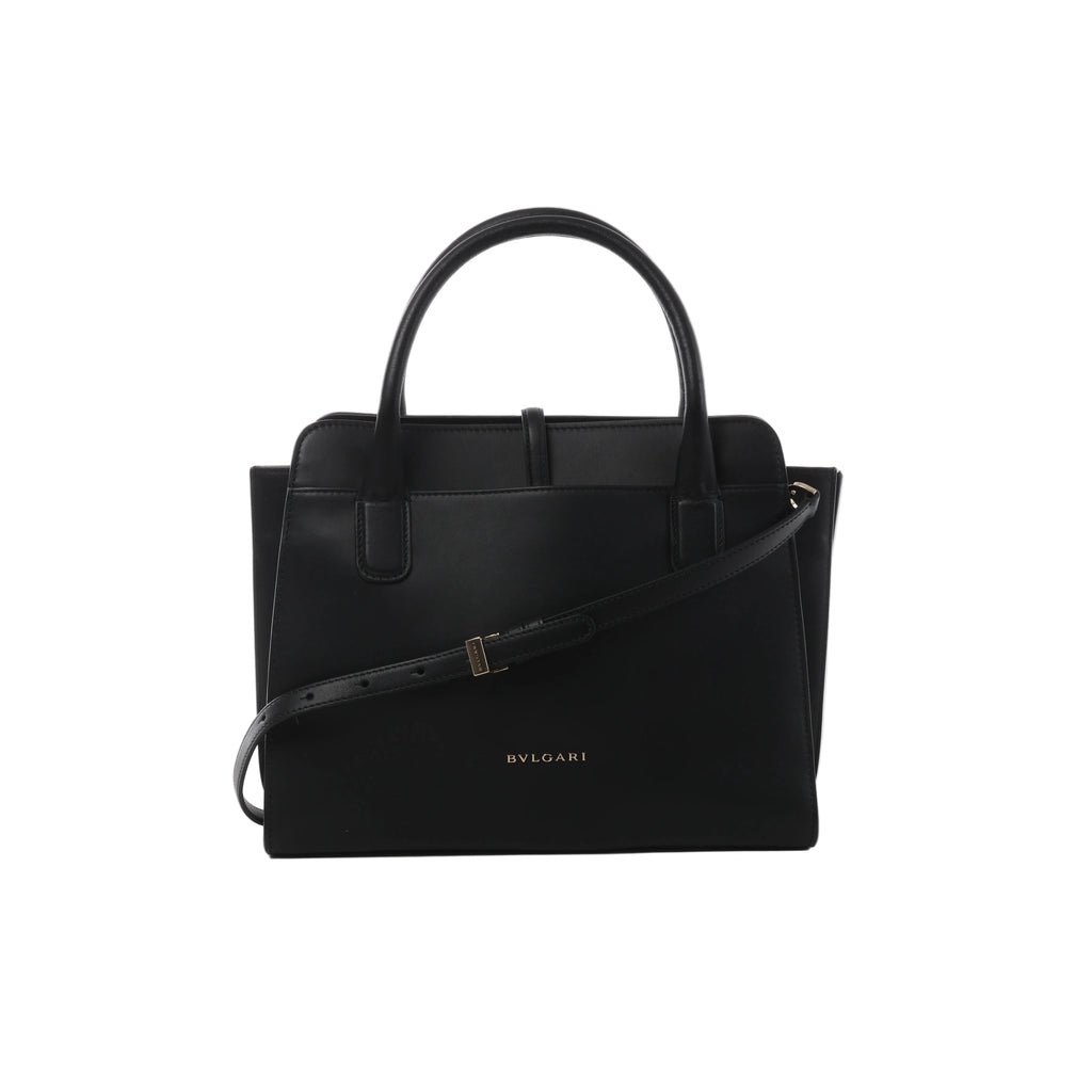 Black Bvlgari Alba leather handbag with structured top handles, slim shoulder strap, clean rectangular silhouette and gold-tone Bvlgari logo.
