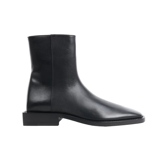 Side view of a black Balenciaga BB Logo leather ankle boot in size 37 EU, featuring a smooth calfskin upper, square low heel, pointed toe, and clean minimalist design on a white background.