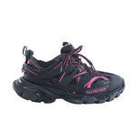 Balenciaga Track black and pink sneaker with layered panels, mesh inserts, double laces, Balenciaga logo and chunky sculpted sole.