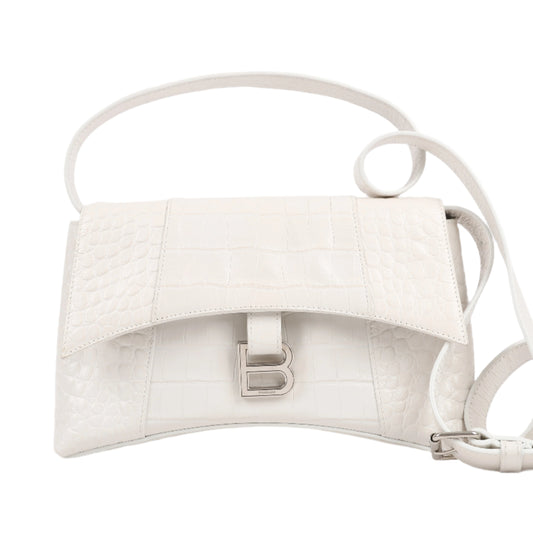 White handbag with a visible brand logo on a light gray background