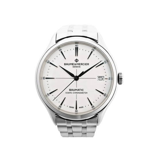 Baume & Mercier Clifton Baumatic M0A10505 automatic watch with white dial, black markers, date window at 3 o'clock, and stainless steel bracelet, shown on a white background.