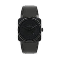 Bell & Ross BR 03-92 Phantom watch with black square case, four corner screws, black dial with large 12-3-6-9 numerals, date window, and black rubber strap.