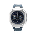 Bell & Ross BR 05 chronograph watch with square stainless steel case, blue dial, two subdials, date window at 4 o’clock, and blue rubber strap
