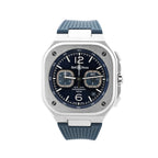 Bell & Ross BR 05 chronograph watch with square stainless steel case, blue dial, two subdials, date window at 4 o’clock, and blue rubber strap