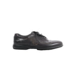 Berluti black leather lace-up shoe with calligraphy detailing on the side and low-profile black sole on white background