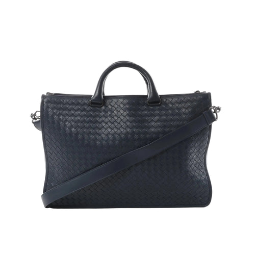 Bottega Veneta navy Intrecciato woven leather briefcase with top handles, zip-top closure, and detachable shoulder strap