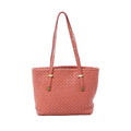 Bottega Veneta pink Intrecciato woven leather shoulder bag with slim shoulder straps, gold-tone hardware, and structured tote silhouette on white background.