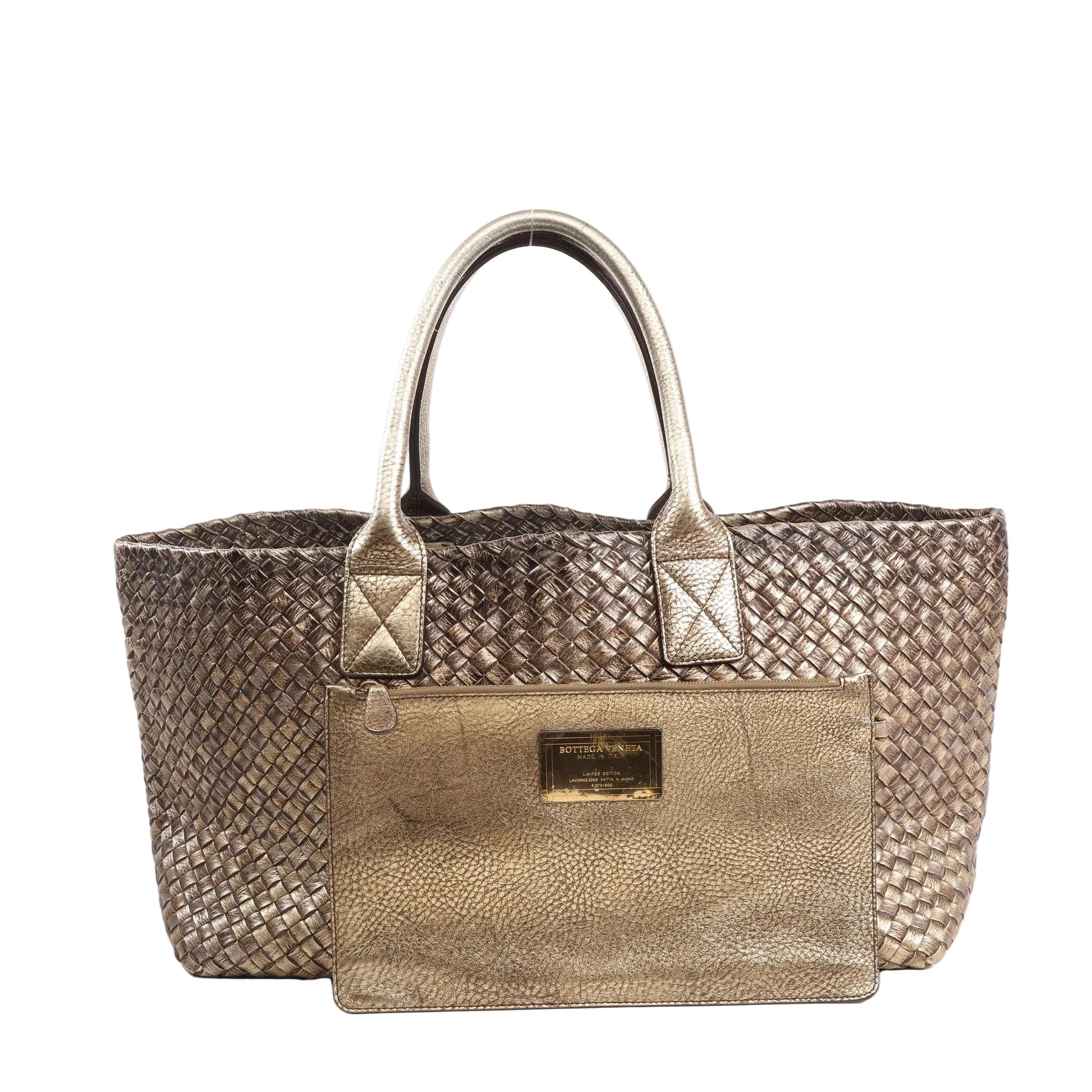 Bottega Veneta Cabas MM shoulder bag made from gold metallic Intrecciato woven leather with dual rolled handles and a soft rectangular silhouette.