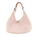 Pink Bottega Veneta Campana Intrecciato leather shoulder bag with woven body, curved hobo shape and dark metal handle rings on a white background.