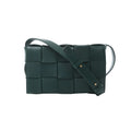 Bottega Veneta Cassette shoulder bag in dark green Maxi Intrecciato leather with oversized woven panels and an adjustable strap.