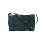 Bottega Veneta Cassette shoulder bag in dark green Maxi Intrecciato leather with oversized woven panels and an adjustable strap.