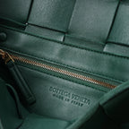 Bottega Veneta Cassette Maxi Intrecciato Leather Crossbody Bag in Green