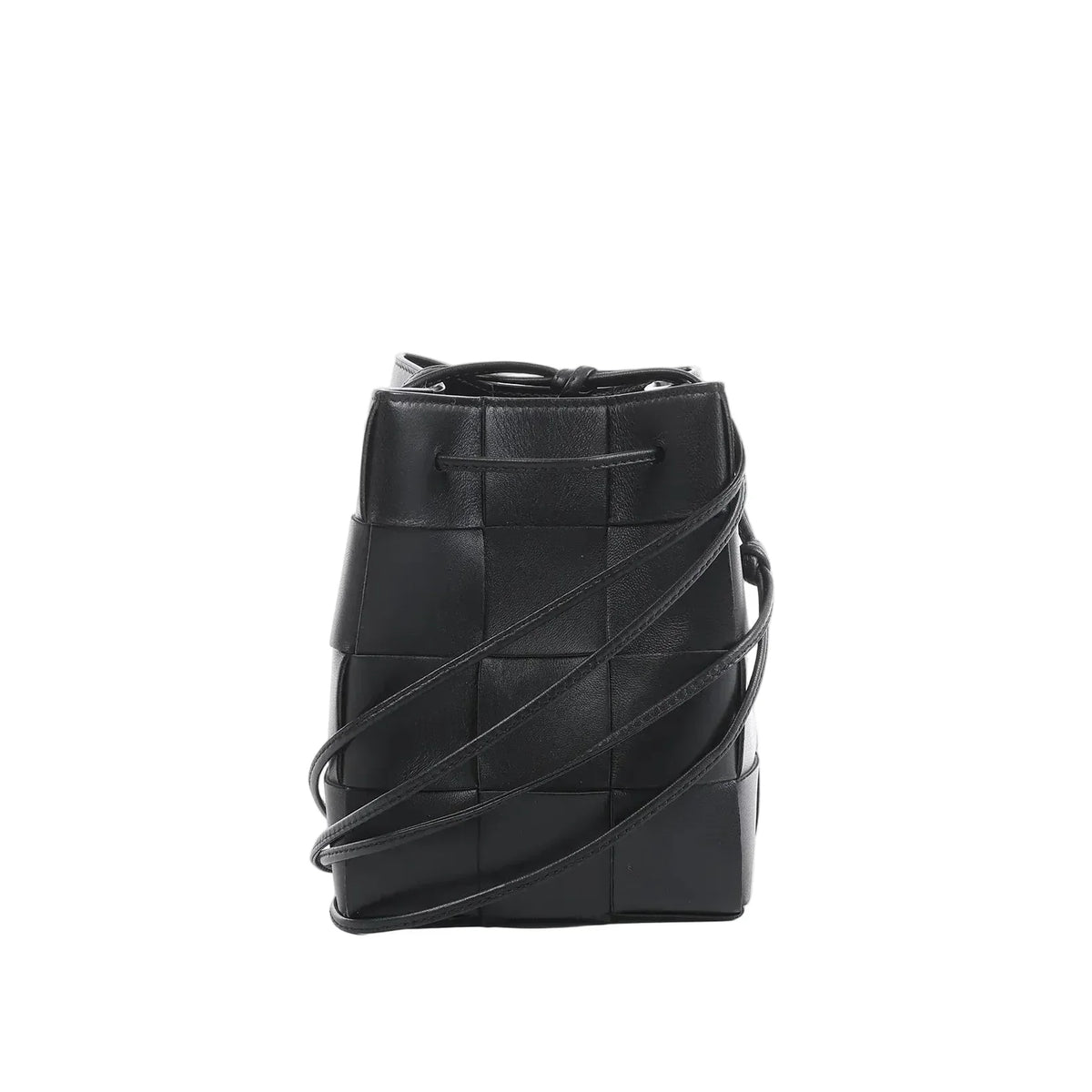 Bottega Veneta Cassette mini bucket bag in black maxi intrecciato woven leather with drawstring top and thin crossbody strap on a white background.