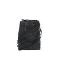 Bottega Veneta Cassette mini bucket bag in black maxi intrecciato woven leather with drawstring top and thin crossbody strap on a white background.