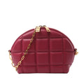 Bottega Veneta burgundy padded leather half-moon crossbody bag with geometric panels, gold-tone chain strap and double zip closure.