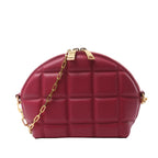 Bottega Veneta burgundy padded leather half-moon crossbody bag with geometric panels, gold-tone chain strap and double zip closure.
