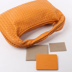 Bottega Veneta Intrecciato Hobo Leather Shoulder Bag in Orange