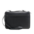 Black Bottega Veneta Intrecciato leather crossbody bag with a woven front panel, top zipper closure, horizontal front zip pocket, and adjustable strap, shown on a white background.