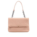 Pink Bottega Veneta Intrecciato woven leather shoulder bag with flap front, dark chain links and a slim leather shoulder strap.