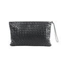 Black Bottega Veneta Intrecciato woven leather clutch with zip-top closure and slim wrist strap.