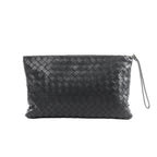 Black Bottega Veneta Intrecciato woven leather clutch with zip-top closure and slim wrist strap.