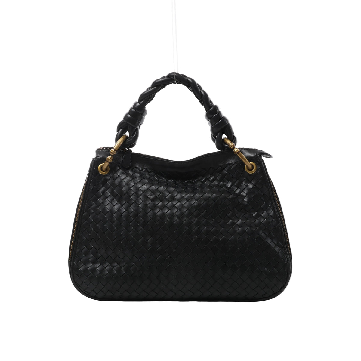 Front view of Bottega Veneta black woven leather bag with a chunky braided handle, gold-tone handle attachments and zip detailing along the sides.