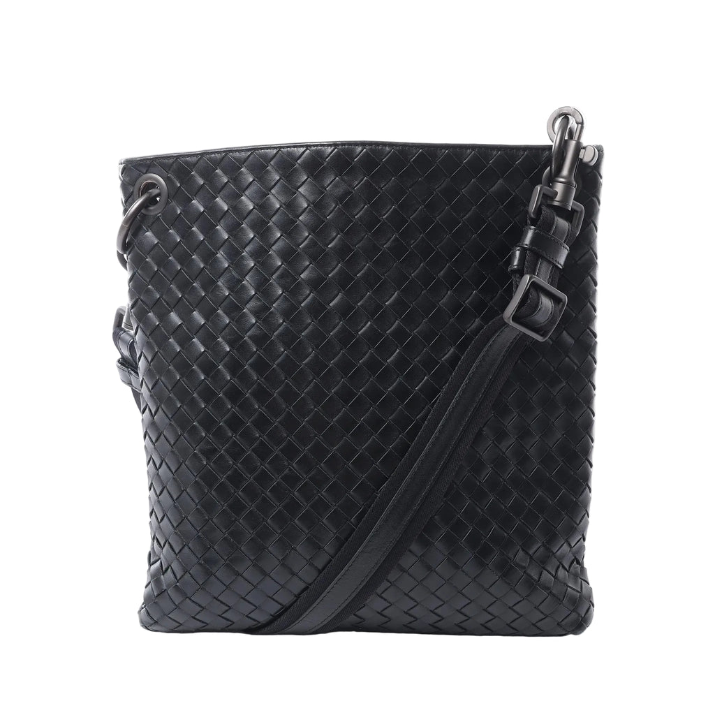 Bottega Veneta black Intrecciato woven leather messenger bag with an adjustable crossbody strap, top zip closure and dark-tone hardware.